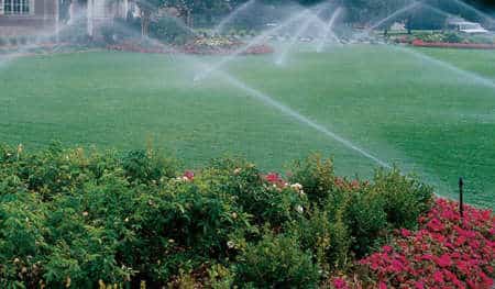 Lawn sprinkler system being winterized before a freeze in Charlotte, NC