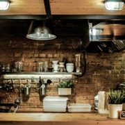 Outdoor kitchen tips with accent lighting and stunning stonework